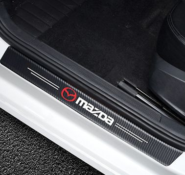 Наклейки защитные на пороги  карбон (60см-2шт; 40см-2шт.)  4шт.  MAZDA