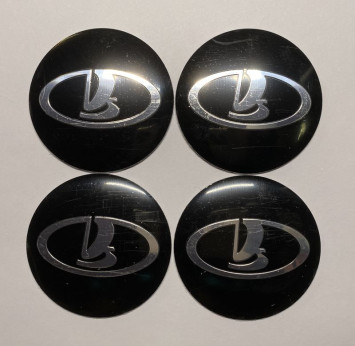 Этикетки на диски (метал)  диам. 56,5мм.  &quot;LADA&quot; черный  (4 шт.)