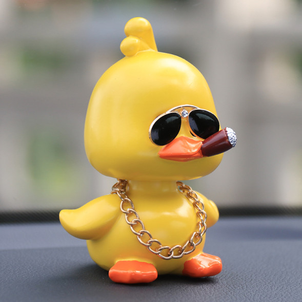 Игрушка на торпедо &quot;УТКА&quot; качающая головой (сигара)