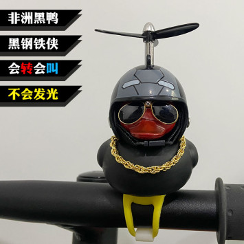 Игрушка на торпедо &quot;УТКА&quot; черная (в шлеме железный человек)   9см*7,5см