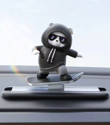 Игрушка на торпедо Медведь скользящий, черный