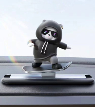 Игрушка на торпедо Медведь скользящий, черный