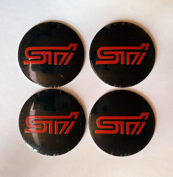 Этикетки на диски (метал)  диам. 56,5мм.  &quot;STI&quot; черный  (4 шт.)