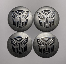 Этикетки на диски (метал)  диам. 56,5мм.  "TRANSFORMER" серебро  (4 шт.)